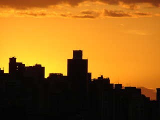 Fototapeta na wymiar Sunset silhouette of the cityscape