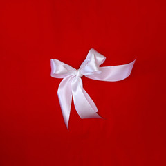 Beautiful original bow of satin ribbon, gift knot