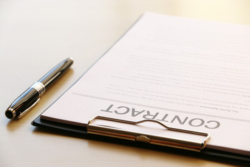Contract paper on businessman desk in Office Business