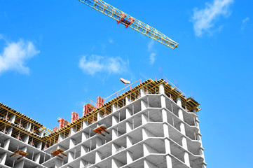 Crane and highrise construction site