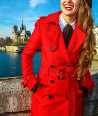 traveller woman on embankment in Paris looking into the distance