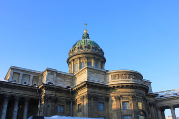 Fototapeta na wymiar Kazan Cathedral (Cathedral of Our Lady of Kazan) in St. Petersburg, Russia. Active Orthodox Cathedral and Museum on Blue Sky Background. Famous Historical City Landmark, Located on Nevsky Prospect.