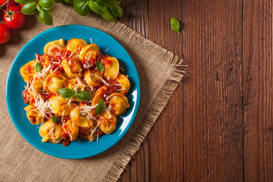 Delicious tortellini with meat in tomato sauce.