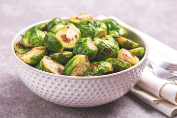 Vegetarian cuisine. Brussels Sprouts roasted with olive oil. Copyspace