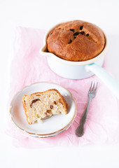 Traditional German Easter Bread, Osterbrot, made of Brioche yeast dough with raisins, eggs, milk, flour, yeast, sugar and butter baked in small saucepan served for Easter Sunday breakfast or brunch