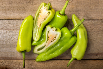Hot Pepper on wood background.