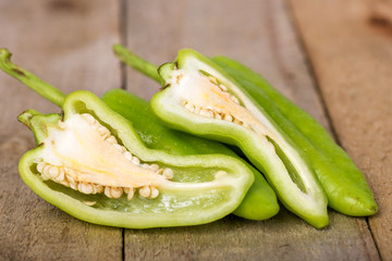 Hot Pepper on wood background