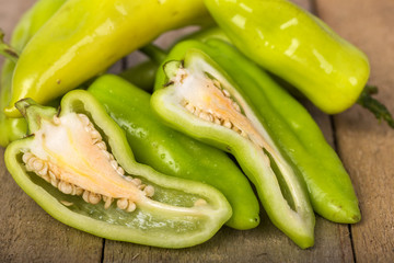 Hot Pepper on wood background