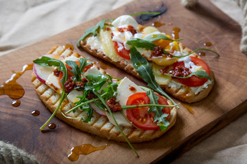 Double toast with egg, aragula, tomato and cheese,French toast bread with veggies,Spring healthy toast