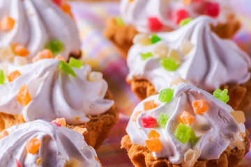 Fototapeta na wymiar Delicious homemade cupcakes with cream, on a plate.