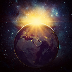 Earth, sun and galaxy. Elements of this image furnished by NASA