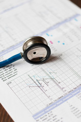 Concept medicine protection of health. Stethoscope on a blank with medical research