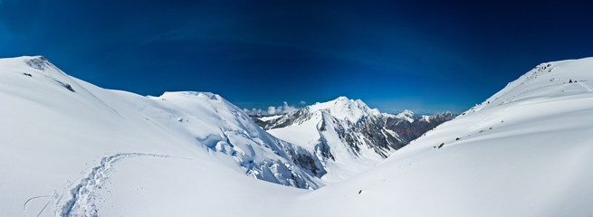 Valley with view to snow mountains 
