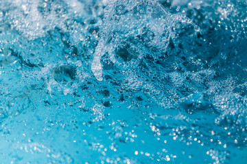 The gush of water of a fountain. Splash of water in the fountain, abstract image