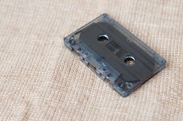 Background of audio cassette on burlap