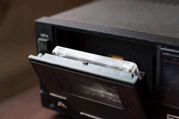 Background, old tape recorder with audio cassette