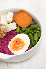 vegetables bowl with boiled egg in bowl