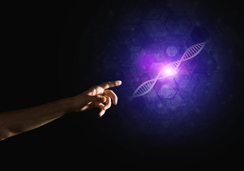 Science medicine and technology concepts as DNA molecule on dark background with connection lines
