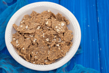 flakes in white bowl