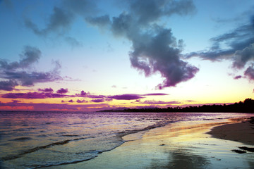 Tropical sunrise with colorful clouds.