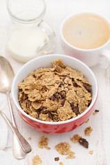 cereals with chocolate cereals in red bowl