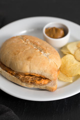 sandwich with meat  and potato on plate