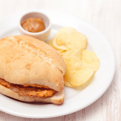 sandwich with meat  and potato on plate