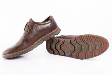 Male brown leather shoe on white background, isolated product, comfortable footwear.