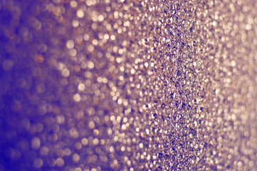 Festive lilac, blue bokeh background with space for text