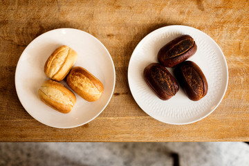 Some Freshly Baked And Some Burnt Buns