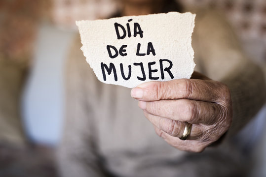 old woman and text womens day in spanish