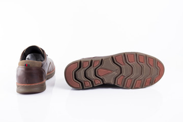 Male brown leather shoe on white background, isolated product, comfortable footwear.