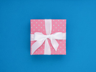 Wrapped vintage gift box. Copy space. Pastel  Colour flat lay minimal concept. Palace blue.