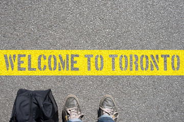 Ein Mann mit der Tasche und eine Begrüßung in Toronto