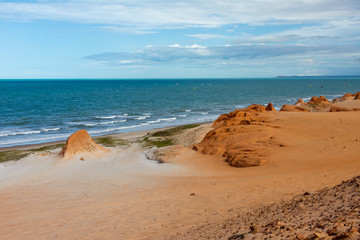 Canoa Quebrada, Brazil, January 2018 - View of windsurfing on the red beach