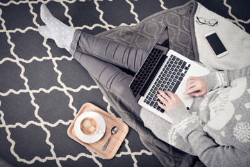 Young creative woman working with laptop