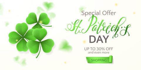 Holiday template of horizontal sale banner for St. Patrick's Day with realistic clovers, ribbon and text. Vector background with clover’s petals for design of flyers with special promotional offers.