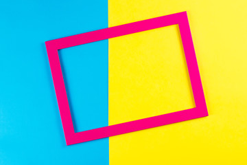 Red color frame on bright yellow and blue background.