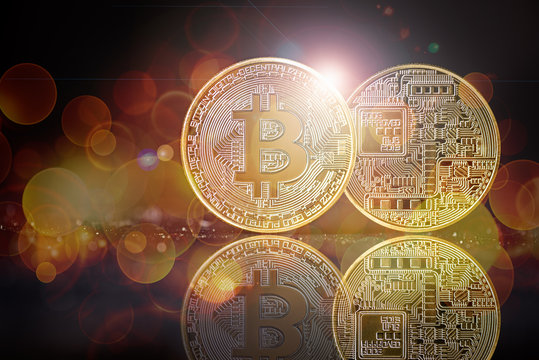 golden bitcoin background with bokeh and flare as concept of global crypto-currency
