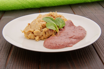 Dumplings with acidic cabbage on a table