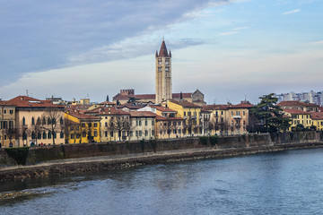 Obraz premium Beautiful panorama of Adige River waterfront in Verona, Italy.