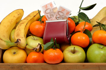 different vegetables and seasonal fruits with cash