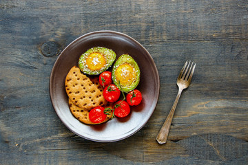 Avocado baked with eggs