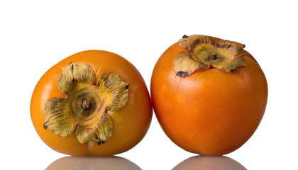 Sweet, vitaminized persimmon fruit isolated on white