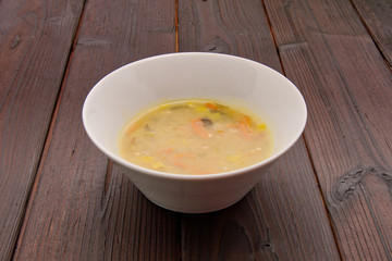 Vegetable soup with buckwheat on a table