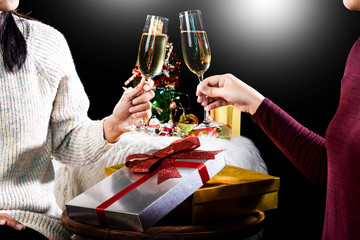 Group of friends having drinks at the party. Young people enjoying at a bar toasting cocktails. making good cheer.