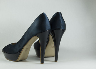 Black satin evening shoes with shiny heels