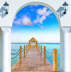 Fototapeta premium wooden open door arch exit to the beach caribbean dominican republic