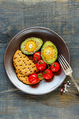 Avocado baked with eggs