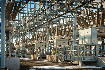 Electrical substation on calm winter day with some snow on ground